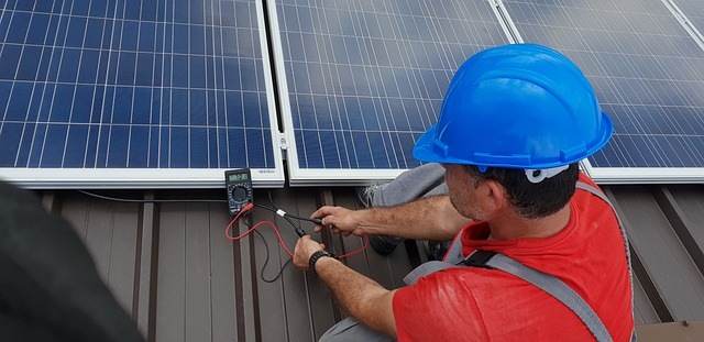technician installing a solar panel system on a roof in ireland