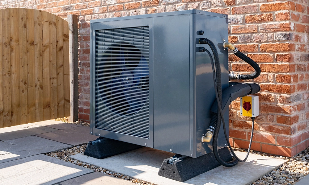 heat-pump-cost air source heat pump outside of house